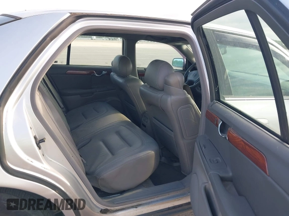 2003 Cadillac DeVille with VIN 1G6KD54YX3U102528, listed as a IAAI auction lot 42159424 with 108,720 mi miles. Bid and sale history available at carsss.com. Image 8.
