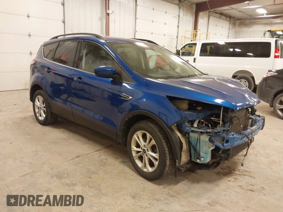 2018 Ford Escape SE with VIN 1FMCU9GD4JUA83470, listed as a IAAI auction lot 41272882 with 105,661 mi miles. Bid and sale history available at carsss.com. Image 1.