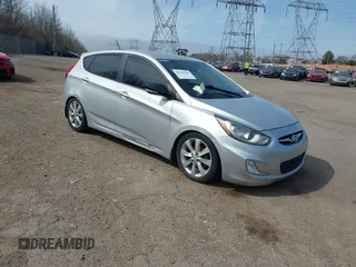 2013 Hyundai Accent SE with VIN KMHCU5AE7DU130683, listed as a IAAI auction lot 41785498 with 167,357 mi miles. Bid and sale history available at carsss.com. Image 1.