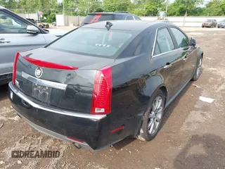 2012 Cadillac CTS Luxury z VIN 1G6DG5E57C0131349, wystawiony jako IAAI lot #42272340 z przebiegiem 61 879 mil mil oraz . Historia ofert i sprzedaży dostępna na DreamBid. Obrazek 4.