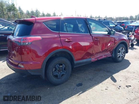 2018 Toyota RAV4 LE with VIN JTMBFREV2JD228186, listed as a IAAI auction lot 42076730 with 93,899 mi miles. Bid and sale history available at carsss.com. Image 4.