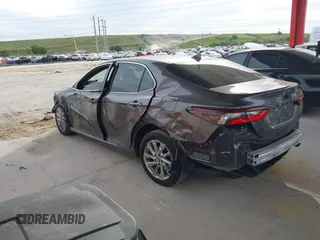 2023 Toyota Camry LE z VIN 4T1C11AK3PU719452, wystawiony jako IAAI lot #38236100 z przebiegiem 34 140 mil mil oraz . Historia ofert i sprzedaży dostępna na DreamBid. Obrazek 15.