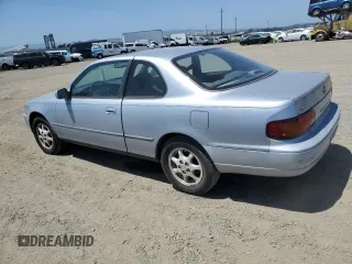 1995 Toyota Camry z VIN 4T1GK12C7SU099655, wystawiony jako Copart lot #58421895 z przebiegiem 89 299 mil mil oraz Czysty tytuł • Clean title. Historia ofert i sprzedaży dostępna na DreamBid. Obrazek 2.