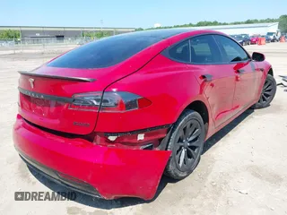 2017 Tesla Model S 100D with VIN 5YJSA1E46HF183568, listed as a IAAI auction lot 42626561 with 110,606 mi miles and . Bid and sale history available at DreamBid. Image 4.