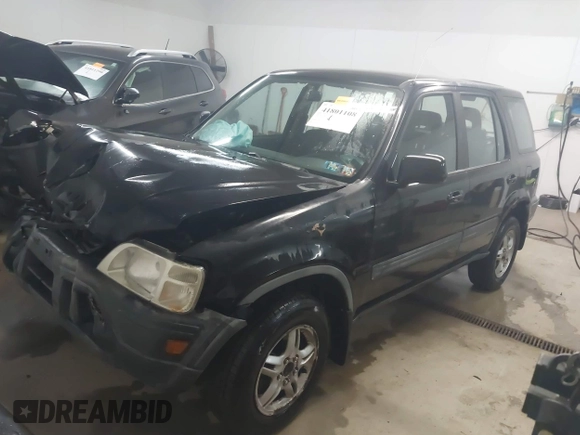 2000 Honda CR-V EX with VIN JHLRD1865YS007202, listed as a IAAI auction lot 41801108 with 134,387 mi miles. Bid and sale history available at carsss.com. Image 17.
