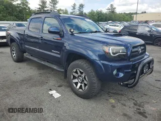 2005 Toyota Tacoma z VIN 5TEMU52N55Z126664, wystawiony jako Copart lot #58775425 z przebiegiem 233 069 mil mil oraz Szkoda całkowita • Salvage title. Historia ofert i sprzedaży dostępna na DreamBid. Obrazek 4.