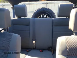 2007 Jeep Wrangler Unlimited Sahara with VIN 1J4GA59197L141821, listed as a Copart auction lot 76897044 with 124,070 mi miles and Salvage title. Bid and sale history available at DreamBid. Image 10.