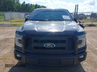 2015 Ford F-150 XL with VIN 1FTEX1C88FKE45401, listed as a IAAI auction lot 42667833 with 250,866 mi miles and . Bid and sale history available at DreamBid. Image 6.