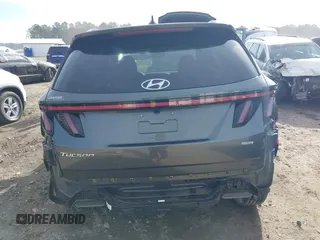 2022 Hyundai Tucson SEL with VIN 5NMJBCAEXNH031855, listed as a IAAI auction lot 41677386 with 40,606 mi miles and . Bid and sale history available at DreamBid. Image 17.