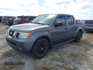 2021 Nissan Frontier SV with VIN 1N6ED0EA7MN719215, listed as a IAAI auction lot 40479330 with Not provided miles and . Bid and sale history available at DreamBid. Image 2.