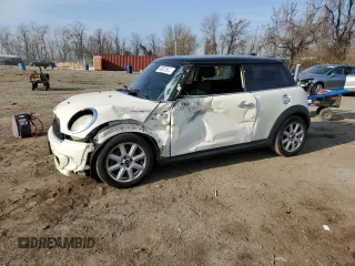2011 MINI Hardtop S with VIN WMWSV3C59BTY23205, listed as a Copart auction lot 48672675 with 120,457 mi miles and Salvage Title. Bid and sale history available at DreamBid. Image 1.