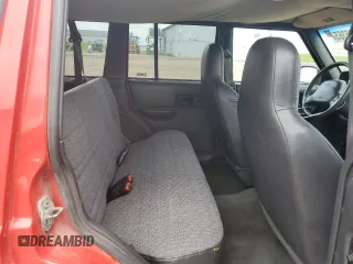 1999 Jeep Cherokee Sport with VIN 1J4FF68S4XL580048, listed as a Copart auction lot 62546365 with 154,059 mi miles and Clean title. Bid and sale history available at DreamBid. Image 11.