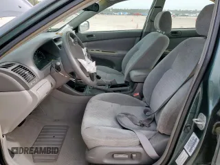 2003 Toyota Camry LE z VIN 4T1BF32K13U554339, wystawiony jako Copart lot #55972595 z przebiegiem 69 549 mil mil oraz Szkoda całkowita • Salvage title. Historia ofert i sprzedaży dostępna na DreamBid. Obrazek 7.