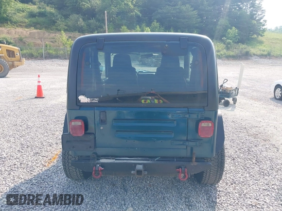 1998 Jeep Wrangler Sport with VIN 1J4FY19S2WP786844, listed as a IAAI auction lot 42382789 with 306,228 mi miles and . Bid and sale history available at DreamBid. Image 17.