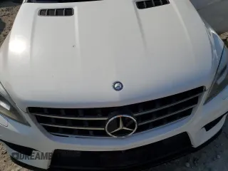 2014 Mercedes-Benz M 63 AMG z VIN 4JGDA7EB6EA344690, wystawiony jako Copart lot #59296955 z przebiegiem 98 090 mil mil oraz Czysty tytuł • Clean title. Historia ofert i sprzedaży dostępna na DreamBid. Obrazek 12.