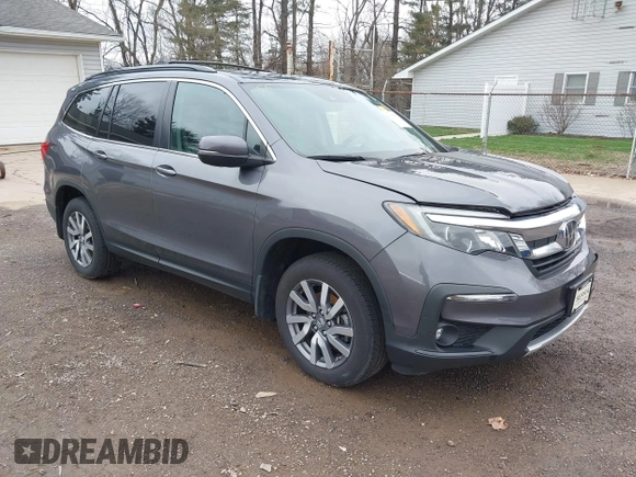 2020 Honda Pilot EX-L z VIN 5FNYF6H53LB059294, wystawiony jako IAAI lot #41910511 z przebiegiem 55 737 mil mil oraz . Historia ofert i sprzedaży dostępna na DreamBid. Obrazek 1.