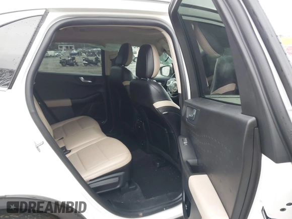 2020 Ford Escape Titanium Hybrid with VIN 1FMCU9DZ0LUC56274, listed as a IAAI auction lot 41256530 with 43,502 mi miles and . Bid and sale history available at DreamBid. Image 8.
