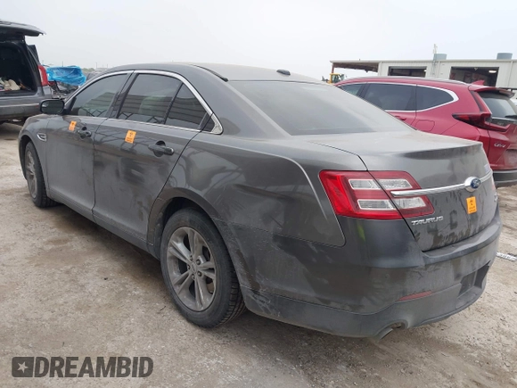 2015 Ford Taurus SEL z VIN 1FAHP2E85FG209085, wystawiony jako IAAI lot #41944532 z przebiegiem 143 850 mil mil oraz . Historia ofert i sprzedaży dostępna na DreamBid. Obrazek 3.