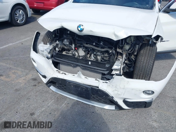 2018 BMW X1 xDrive28i with VIN WBXHT3C37J5K28375, listed as a IAAI auction lot 42039336 with 28,664 mi miles. Bid and sale history available at carsss.com. Image 6.