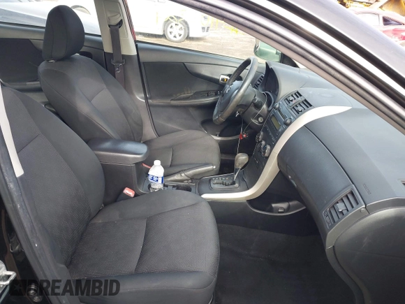 2009 Toyota Corolla with VIN 2T1BU40E29C124161, listed as a IAAI auction lot 41091324 with 128,310 mi miles. Bid and sale history available at carsss.com. Image 5.