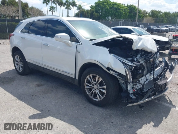 2020 Cadillac XT5 Premium Luxury FWD with VIN 1GYKNCRS7LZ129119, listed as a IAAI auction lot 41710878 with 52,575 mi miles and . Bid and sale history available at carsss.com. Image 1.