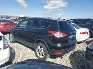2014 Ford Escape Titanium with VIN 1FMCU9JX5EUC66899, listed as a Copart auction lot 48939795 with 125,814 mi miles and Salvage Title. Bid and sale history available at carsss.com. Image 2.