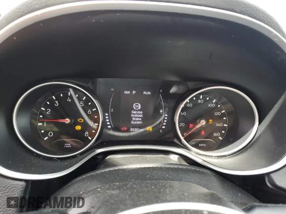 2020 Jeep Compass Latitude with VIN 3C4NJDBB6LT165048, listed as a Copart auction lot 56165965 with 83,351 mi miles and Salvage title. Bid and sale history available at DreamBid. Image 9.