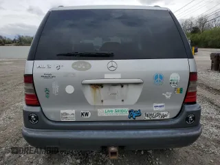 1999 Mercedes-Benz M 320/430/500 with VIN 4JGAB54E9XA127797, listed as a Copart auction lot 51408235 with 243,566 mi miles and Salvage title. Bid and sale history available at DreamBid. Image 6.