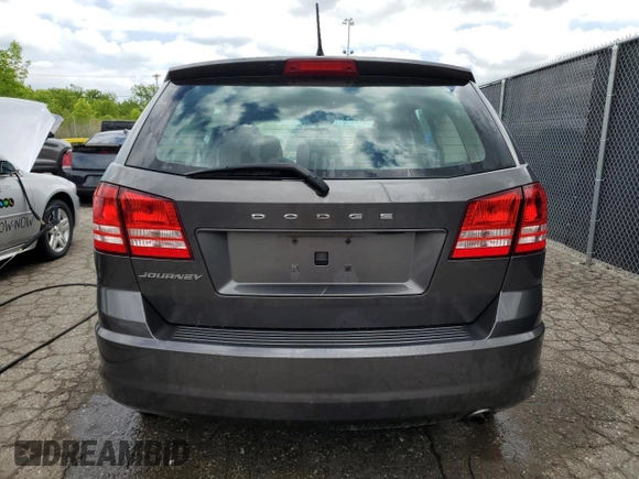 2014 Dodge Journey American Value with VIN 3C4PDCAB1ET135504, listed as a Copart auction lot 58803645 with 164,501 mi miles and Clean title. Bid and sale history available at DreamBid. Image 6.