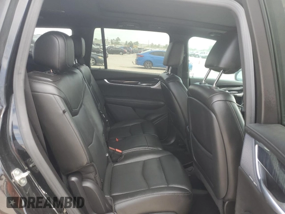 2023 Cadillac XT6 FWD Premium Luxury with VIN 1GYKPCRS6PZ127331, listed as a Copart auction lot 52951105 with 47,796 mi miles and Salvage Title. Bid and sale history available at carsss.com. Image 11.