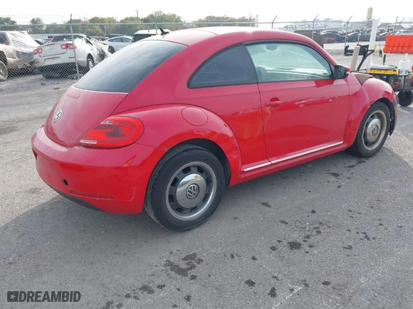 2012 Volkswagen Beetle 2.5L PZEV with VIN 3VWJP7AT0CM641164, listed as a IAAI auction lot 40698387 with 113,200 mi miles. Bid and sale history available at carsss.com. Image 4.