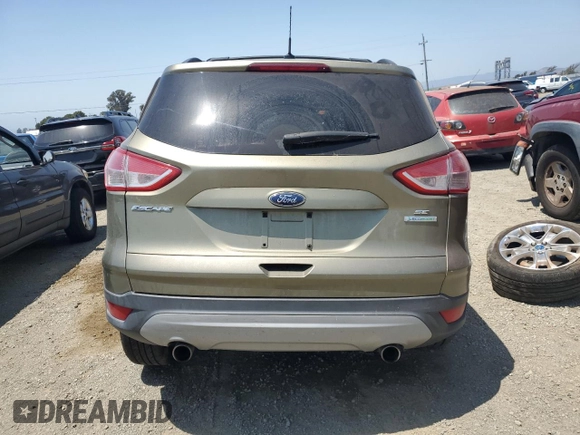 2013 Ford Escape SE with VIN 1FMCU0GX4DUB91663, listed as a Copart auction lot 59167195 with 115,081 mi miles and Salvage title. Bid and sale history available at DreamBid. Image 6.