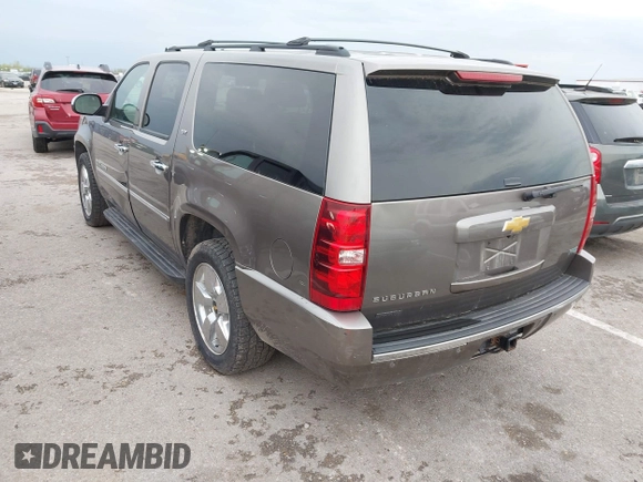 2011 Chevrolet Suburban LTZ with VIN 1GNSKKE32BR197356, listed as a IAAI auction lot 42052377 with 248,574 mi miles and . Bid and sale history available at DreamBid. Image 3.