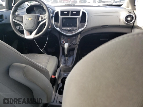 2018 Chevrolet Sonic LS with VIN 1G1JB5SH1J4133593, listed as a Copart auction lot 87556125 with 26,459 mi miles and Salvage title. Bid and sale history available at DreamBid. Image 8.