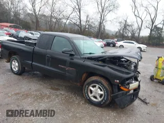 1997 Dodge Dakota with VIN 1B7GL23X2VS209651, listed as a IAAI auction lot 41421859 with 246,016 mi miles. Bid and sale history available at carsss.com. Image 1.