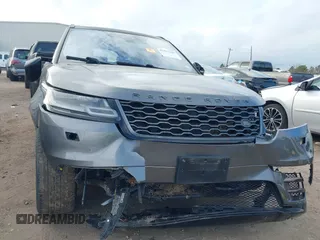 2018 Land Rover Range Rover Velar R-Dynamic SE z VIN SALYL2RX0JA758835, wystawiony jako IAAI lot #41417635 z przebiegiem 84 212 mil mil oraz . Historia ofert i sprzedaży dostępna na DreamBid. Obrazek 11.