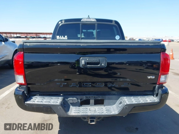 2016 Toyota Tacoma SR with VIN 3TMCZ5AN3GM019210, listed as a IAAI auction lot 42003617 with 171,581 mi miles. Bid and sale history available at carsss.com. Image 6.