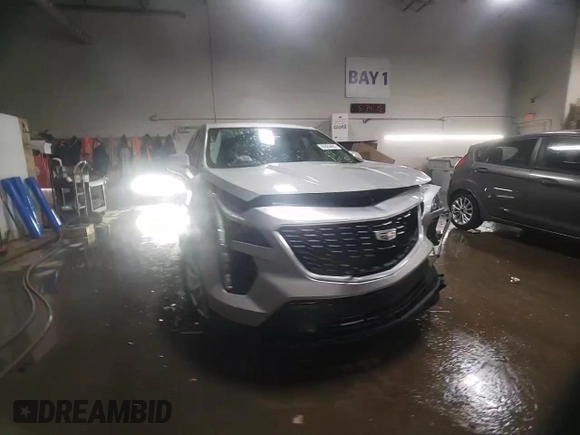 2019 Cadillac XT4 AWD Luxury with VIN 1GYFZBR44KF128401, listed as a Copart auction lot 45926895 with 76,303 mi miles and Salvage Title. Bid and sale history available at carsss.com. Image 13.