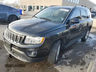 2011 Jeep Compass with VIN 1J4NT1FB1BD192241, listed as a Copart auction lot 48033115 with 60,123 mi miles and Salvage Title. Bid and sale history available at carsss.com. Image 1.