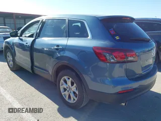 2015 Mazda CX-9 Sport z VIN JM3TB2BAXF0465720, wystawiony jako IAAI lot #42305436 z przebiegiem 130 543 mil mil oraz . Historia ofert i sprzedaży dostępna na DreamBid. Obrazek 3.
