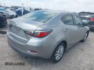 2016 Scion iA z VIN 3MYDLBZV4GY133476, wystawiony jako IAAI lot #42115431 z przebiegiem 112 087 mil mil oraz . Historia ofert i sprzedaży dostępna na DreamBid. Obrazek 4.