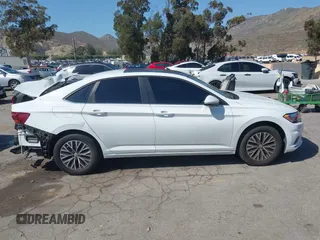 2019 Volkswagen Jetta S with VIN 3VWC57BU7KM257127, listed as a IAAI auction lot 42236060 with 53,985 mi miles and . Bid and sale history available at DreamBid. Image 13.