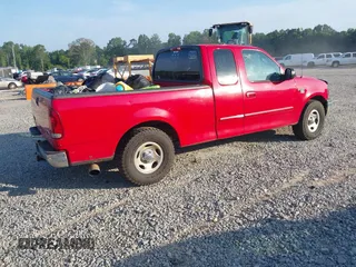 2003 Ford F-150 XL with VIN 1FTRX17W53NB27062, listed as a IAAI auction lot 42584279 with Not provided miles and . Bid and sale history available at DreamBid. Image 4.