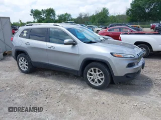 2016 Jeep Cherokee Latitude z VIN 1C4PJMCB4GW144884, wystawiony jako IAAI lot #42693945 z przebiegiem 162 295 mil mil oraz . Historia ofert i sprzedaży dostępna na DreamBid. Obrazek 1.