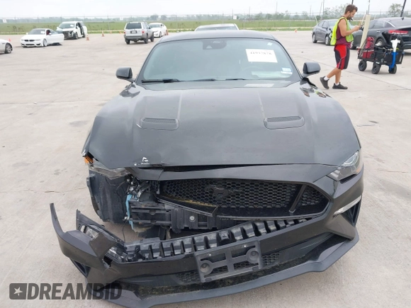 2021 Ford Mustang GT z VIN 1FA6P8CF2M5149691, wystawiony jako IAAI lot #41937878 z przebiegiem 57 865 mil mil oraz . Historia ofert i sprzedaży dostępna na DreamBid. Obrazek 12.