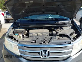 2011 Honda Odyssey EX-L with VIN 5FNRL5H6XBB073482, listed as a IAAI auction lot 42090463 with 213,061 mi miles and . Bid and sale history available at carsss.com. Image 10.