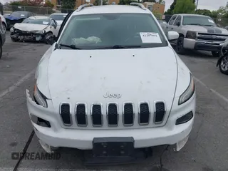 2016 Jeep Cherokee Limited with VIN 1C4PJLDB3GW165217, listed as a IAAI auction lot 42207091 with 102,328 mi miles and . Bid and sale history available at DreamBid. Image 12.
