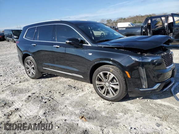 2021 Cadillac XT6 Premium Luxury z VIN 1GYKPDRS6MZ150397, wystawiony jako Copart lot #85137654 z przebiegiem 52 305 mil mil oraz Szkoda całkowita • Salvage title. Historia ofert i sprzedaży dostępna na DreamBid. Obrazek 4.