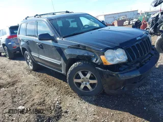 2008 Jeep Grand Cherokee Laredo with VIN 1J8GR48K78C147095, listed as a IAAI auction lot 41848539 with 118,812 mi miles. Bid and sale history available at carsss.com. Image 1.
