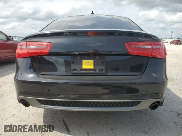 2014 Audi A6 Prestige z VIN WAUHGAFC8EN062243, wystawiony jako Copart lot #54622005 z przebiegiem 106 729 mil mil oraz Szkoda całkowita • Salvage title. Historia ofert i sprzedaży dostępna na DreamBid. Obrazek 6.